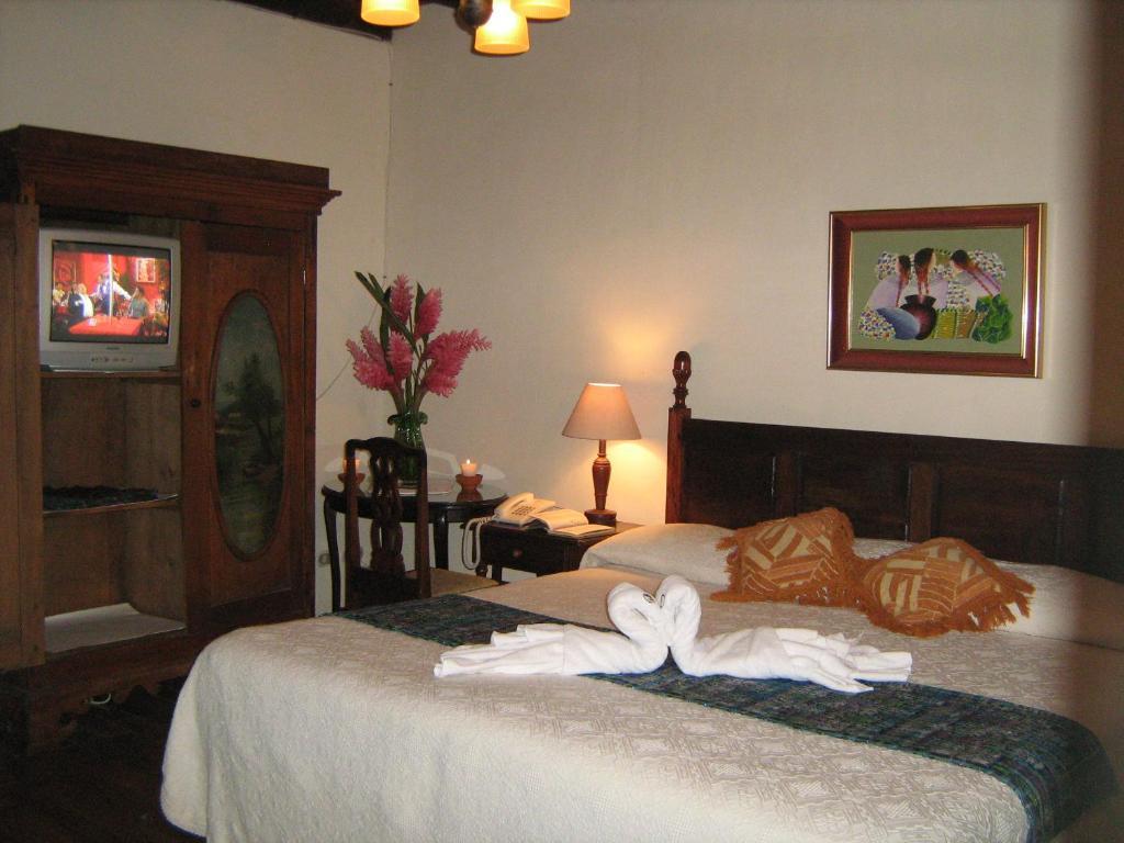 Hotel Posada De Maria Antigua Habitación foto